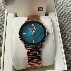 Anne Klein Women's Genuine
Diamond Dial Bracelet Watch